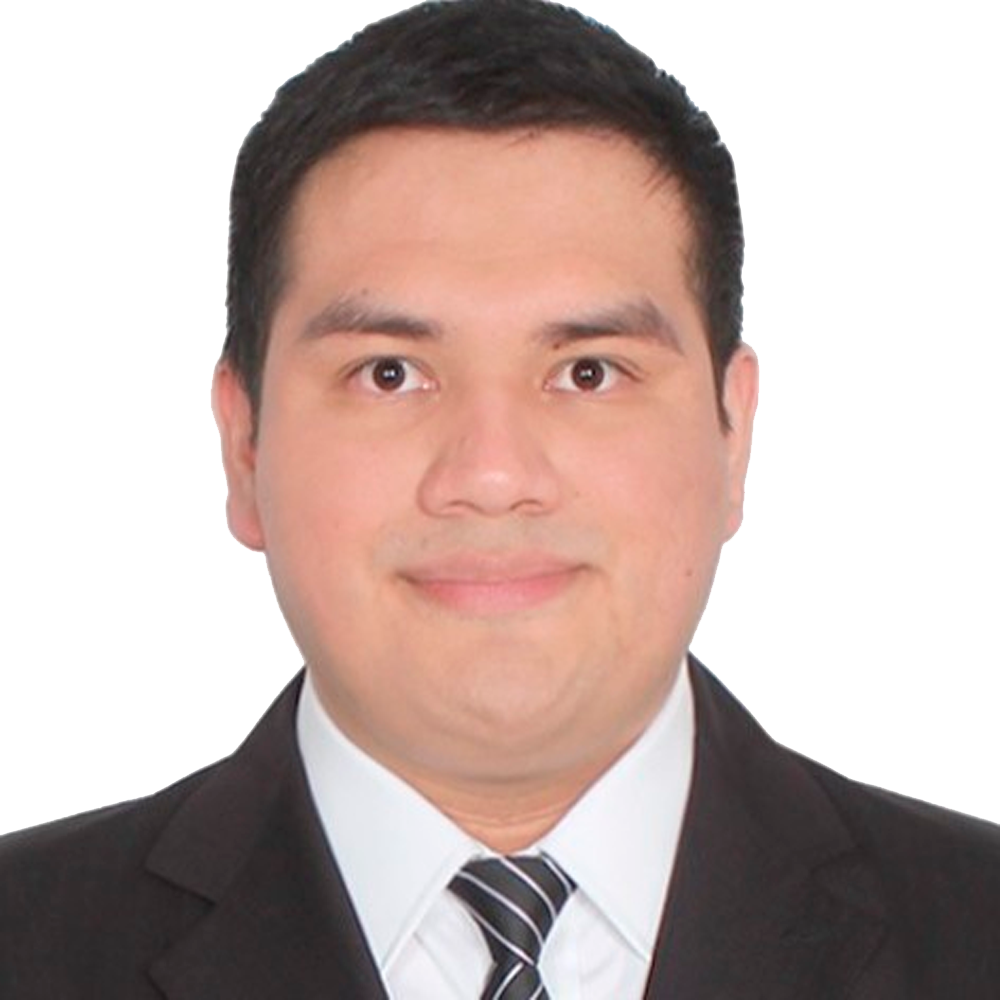 Profile picture of a person with short hair and a beard, wearing a black vest and white shirt, with a blurred outdoor background