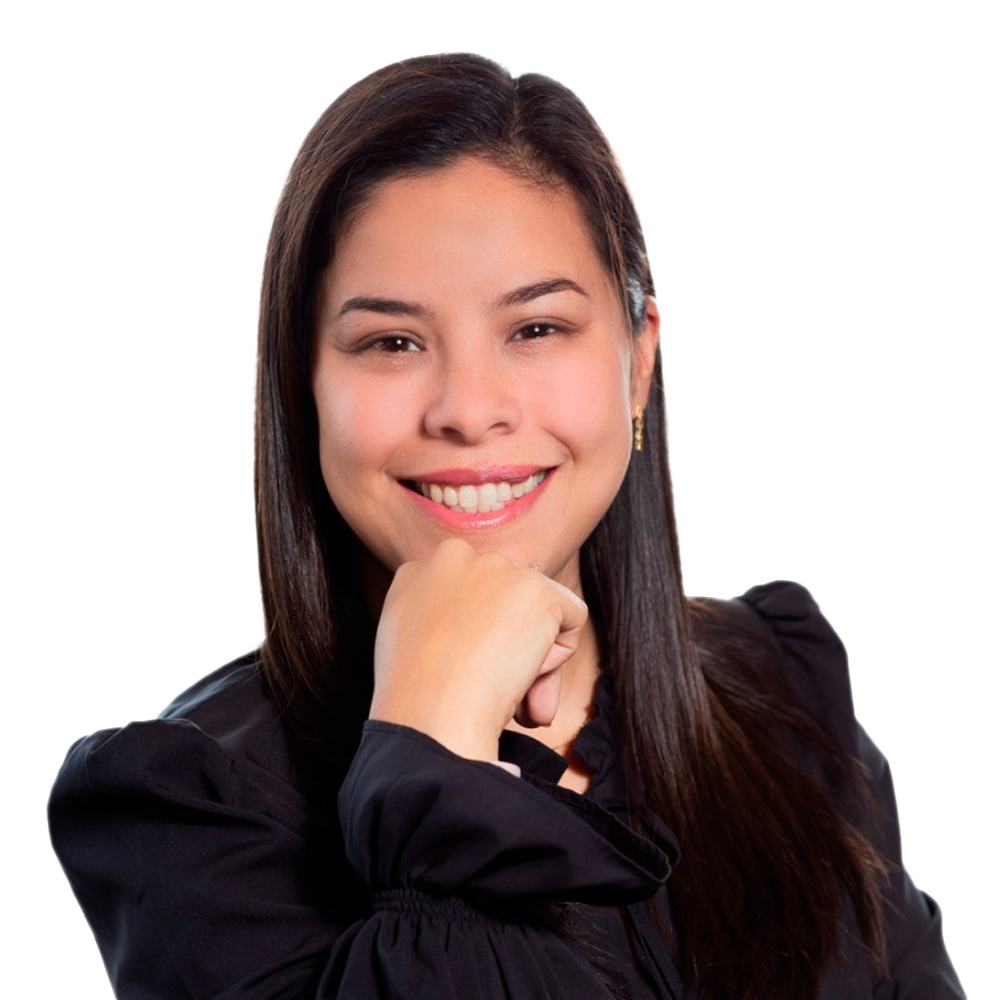Profile picture of a person with short hair and a beard, wearing a black vest and white shirt, with a blurred outdoor background