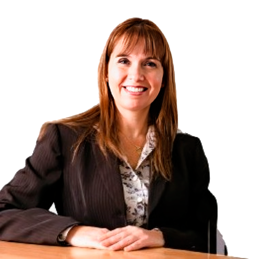 Profile picture of a person with short hair and a beard, wearing a black vest and white shirt, with a blurred outdoor background